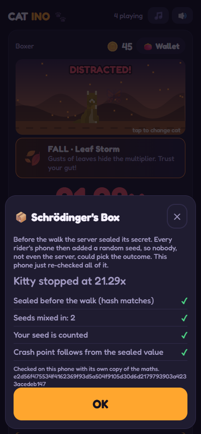 A phone showing the opened box with four green checks